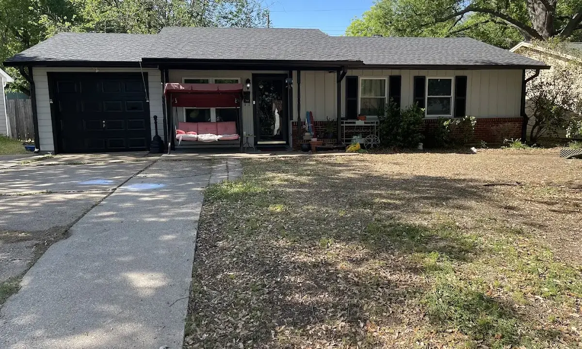 Asphalt Shingle Roof Repair crew at work on a residential roof in Irondale